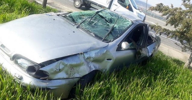 Hurdaya dönen otomobilden burnu kanamadan çıktı