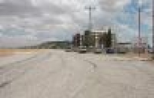 ACİL SERVİS YOLU GENİŞLETİLİP ASFALTLANDI