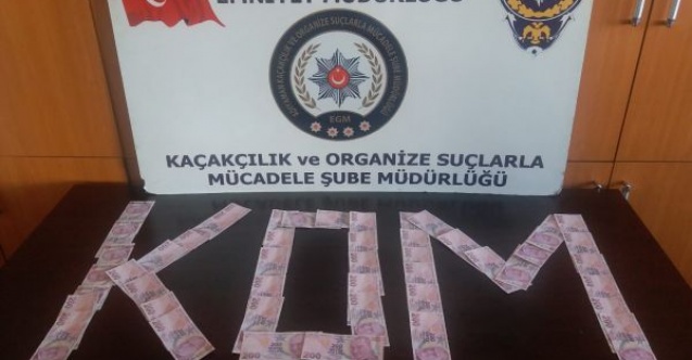 Sahte para sürenler yakayı polise kaptırdı